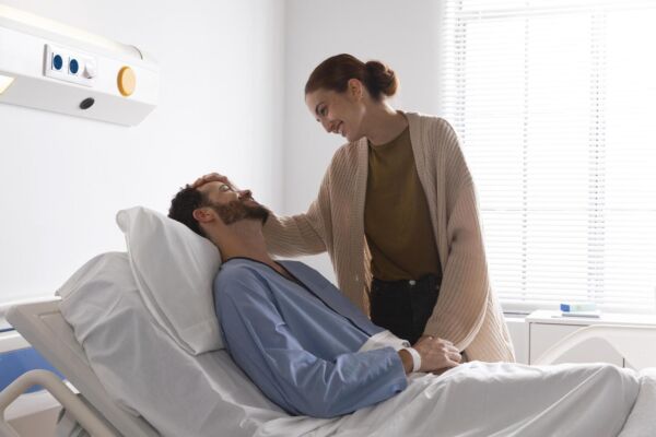 Hiatal hernia patient with his wife
