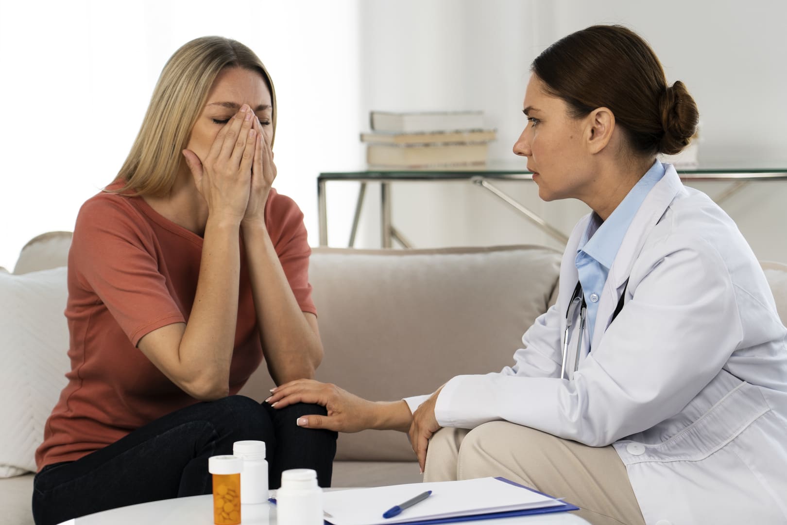 Doctor consoling a hiatal hernia patient
