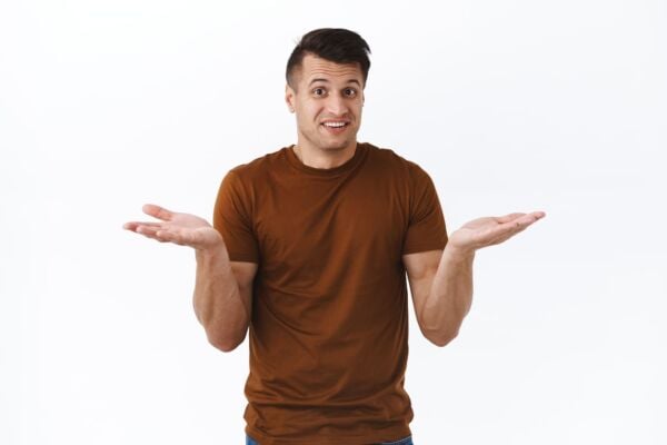 Man with heartburn with his palms open