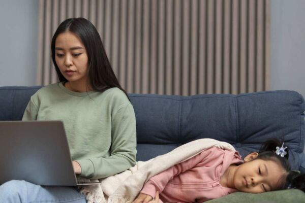 Parent with her child with gastroparesis sleeping