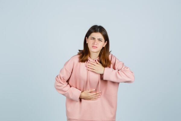Woman with GERD in pain