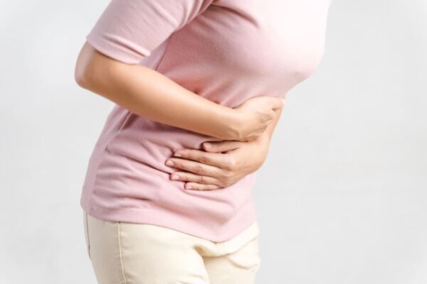 Woman with hiatal hernia in pain