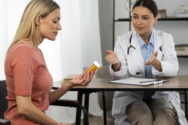 Doctor explaining to patient how gastroparesis medicine works