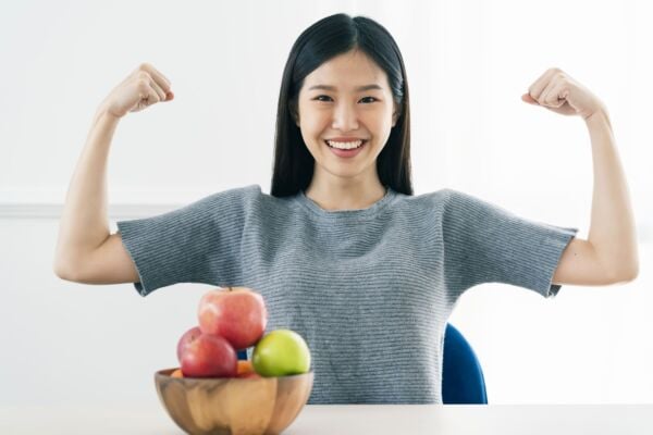 Healthy woman after having acid reflux surgery
