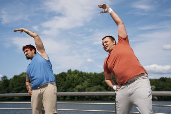 Two men with heartburn doing exercise