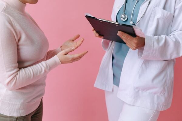 A doctor and patient discussing treatment options for hiatal hernia