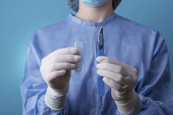 Doctor holding a scalpel