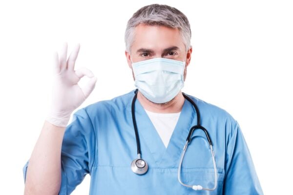 Gastro doctor with an OK hand sign