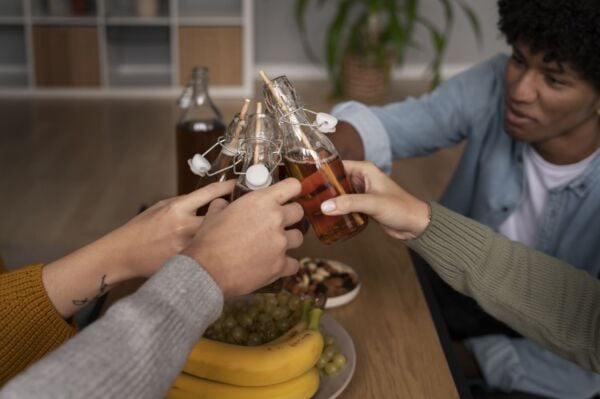 Group of people with heartburn drinking ginger ale