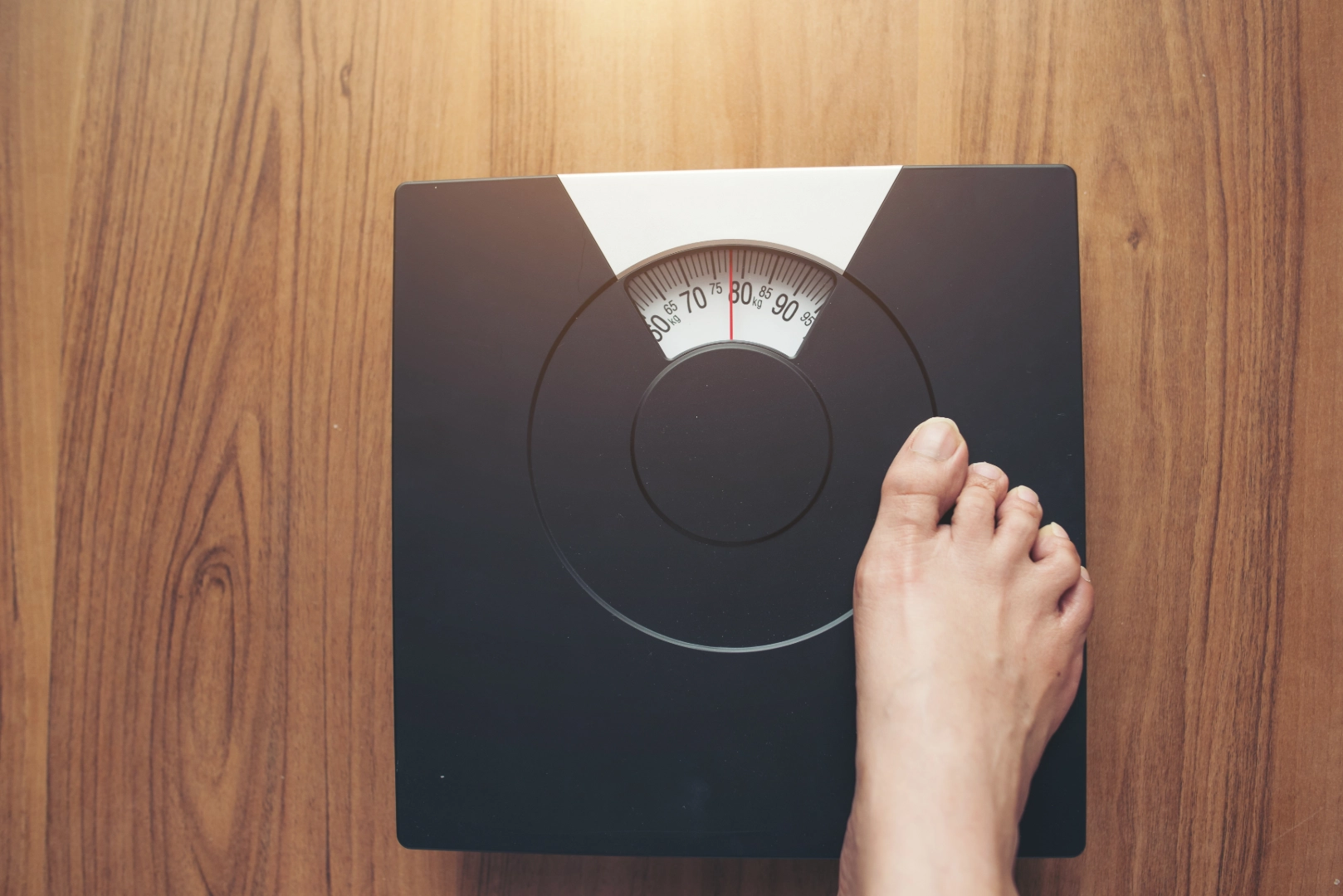 Hiatal hernia patient on weighing scale