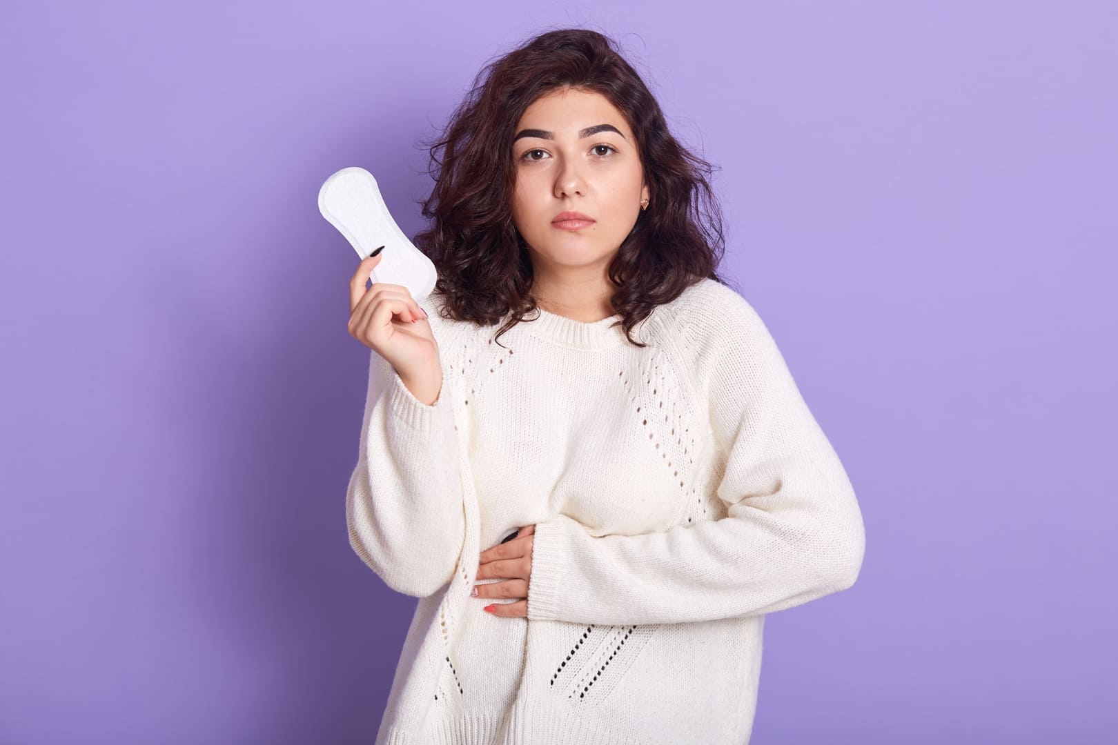 Women getting heartburn during menstruation