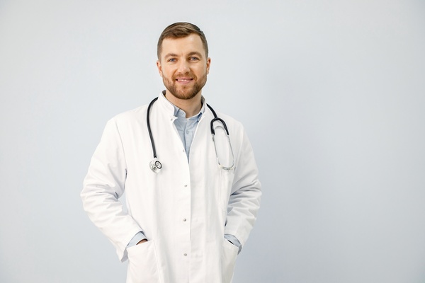 Hiatal doctor with his hands on his pockets