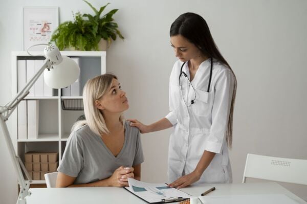 Doctor with a hiatal hernia patient