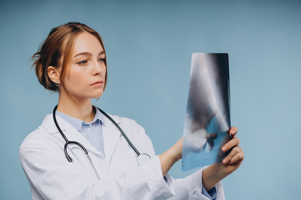 Hiatal hernia doctor looking at x-ray image
