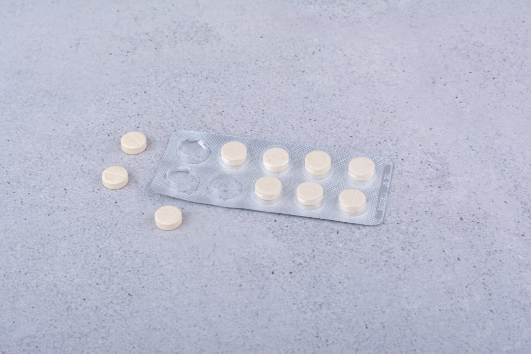 Pack of omeprazole in the ground