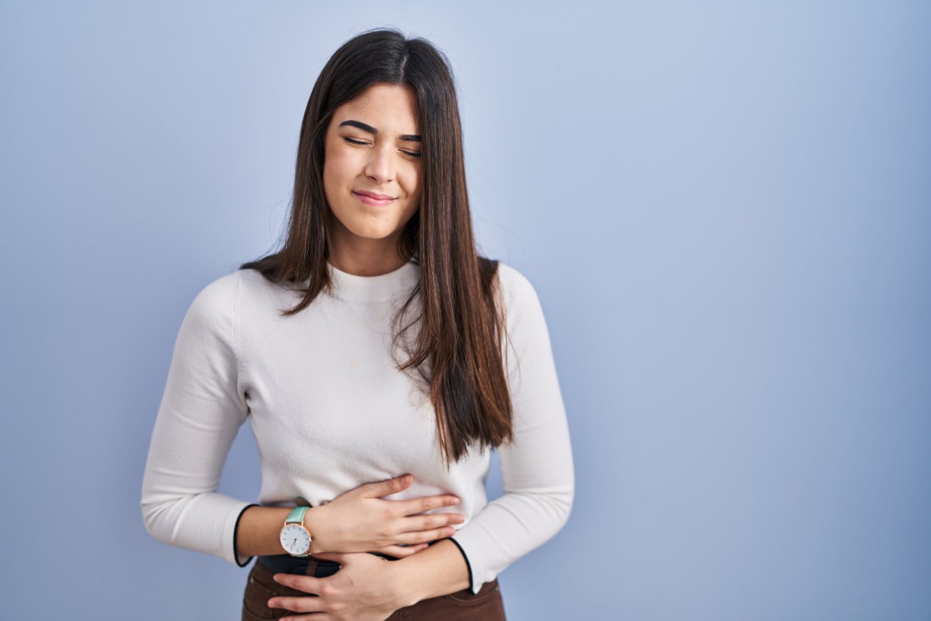 Women with gastroparesis eyes closed in pain