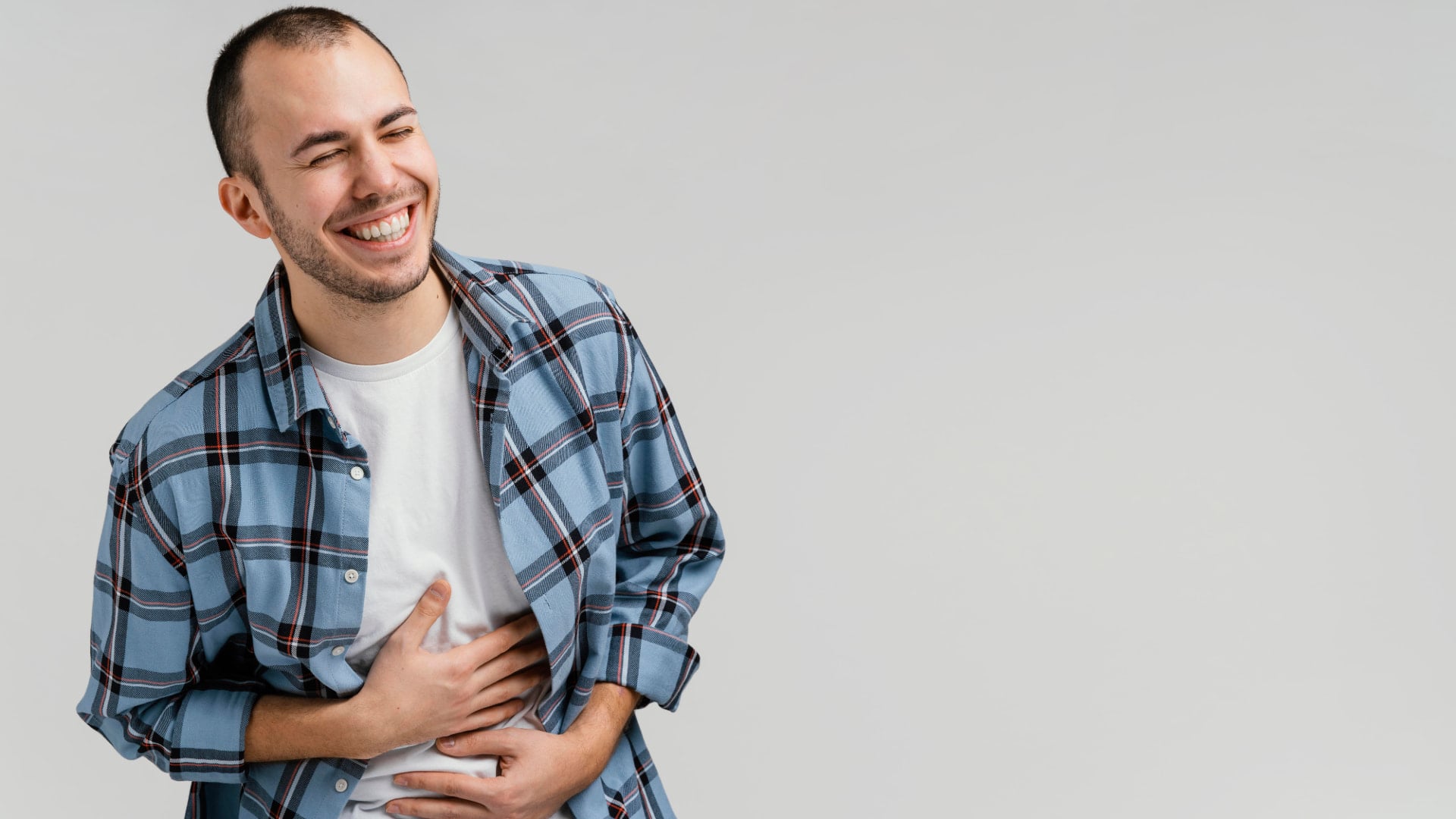 Smiling man with hiatal hernia feels relief