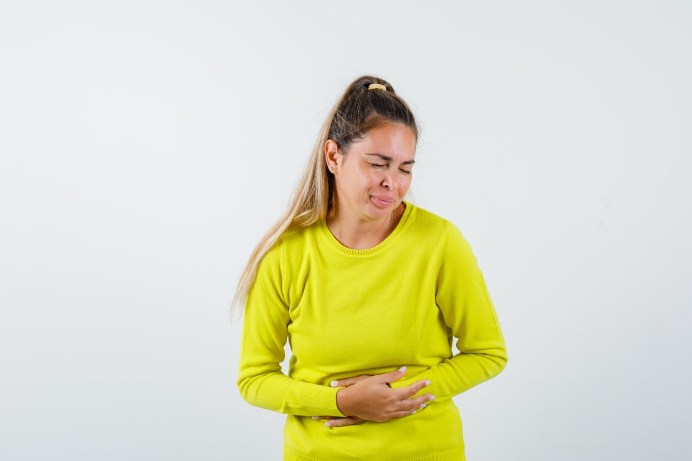 Women with gastroparesis in pain with eyes closed