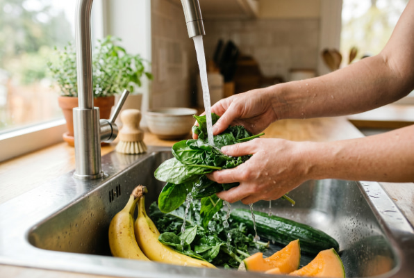 Washing low-acid produce for acid reflux relief
