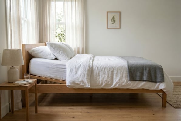 Bed elevated on risers to reduce nighttime acid reflux symptoms