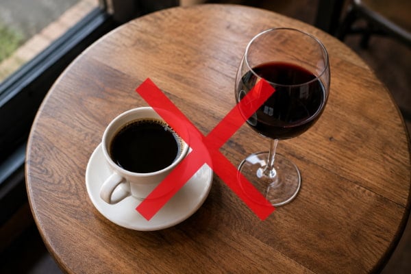 Coffee and wine on a table, common triggers people blame for heart palpitations